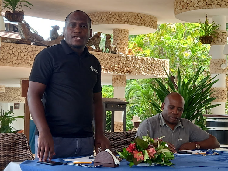 Base Titanium's government and community relations superintendent Ali Masemo and Base compliance and administration superintendent Clapperton Ngome at Leopard Beach Hotel in Kwale county on Tuesday, April 23, 2024.