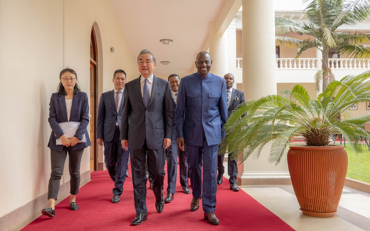 President William Ruto meets with member of the Political Bureau of the Communist Party Of China Central Committee and Director of the Office of Central Committee for Foreign Affairs Wang Yi and other delegates at State House on July 22, 2023.