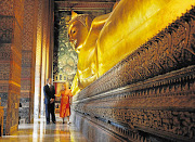 US president Barack Obama visits the Temple of Reclining Buddha at the Wat Pho Royal Monastery in Bangkok, Thailand, yesterday as part of his three-country Asian tour. This is his first international tour since his re-election on November 7, presumably to show he is serious about shifting the US' strategic focus towards the east