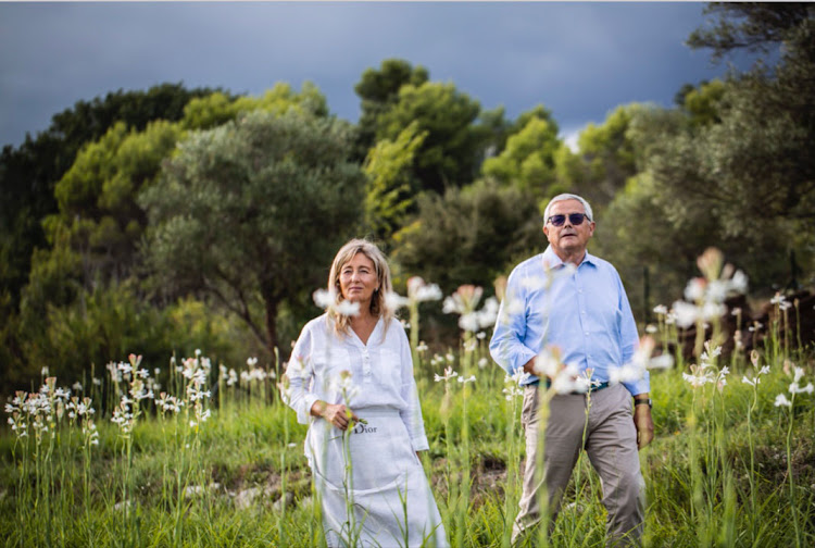 François Demachy and Carole Biancalana walking in the fields of Grasse.