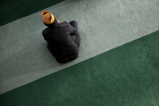 A Muslim attends Friday prayer at the Baitul Futuh Mosque in Morden, south London, Britain, November 20, 2015. REUTERS/Stefan Wermuth