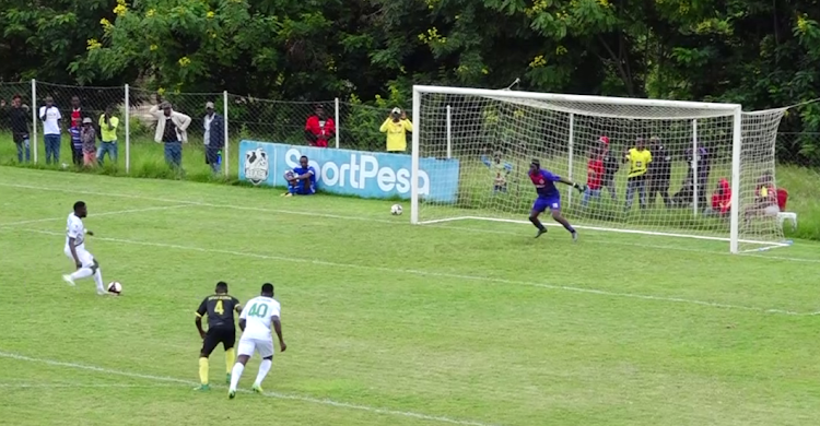 A Gor Mahia player striking a penalty that gave the team a 2-1 lead in the 75th minute.
