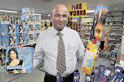 SPECTACULAR: Store owner Arvind Roopanand of Roopanands in Springfield, Durban, shows off some of his wide range of assorted boxes and special-effects fireworks