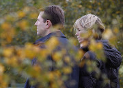 Kate and Gerry McCann walk after speaking about the disappearance of their daughter Madeleine at a news conference in Quorn, central England.