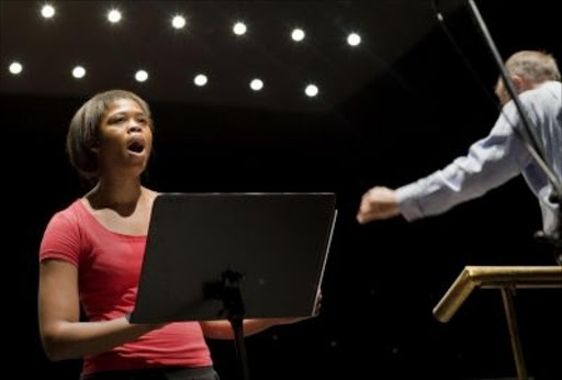 South African opera soprano Pretty Yende rehearsing with the Cape Philharmonic Orchestra in Cape Town.