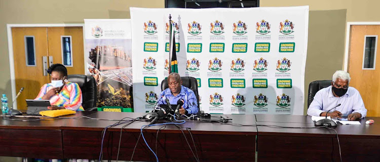 KwaZulu-Natal premier Sihle Zikalala (middle) briefs the media on the surge of Covid-19 cases in the province.