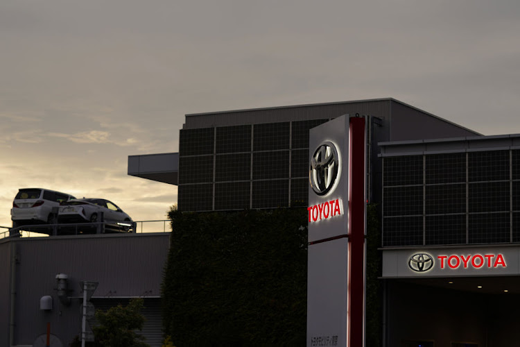 Signage outside a Toyota dealership in Tokyo, Japan, on Sunday, May 10 2020.