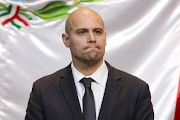 Executive Director of Americans for Safe Aerospace Ryan Graves, listens during a briefing on unidentified flying objects, known as UFOs, at the San Lazaro legislative palace, in Mexico City, Mexico September 12, 2023.  