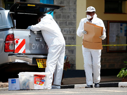 Officers from the DCI leave the Chiromo Mortuary on December 13, 2016 after collecting samples for DNA in an effort to Identify the victims of the Karai road tragedy to their relatives. /JACK OWUOR