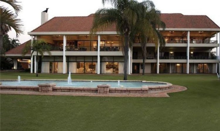 The SIU has obtained a preservation order to freeze a luxury property owned by a company linked to a former lotteries boss.