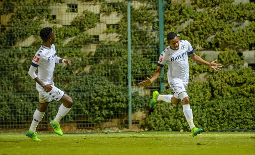 Daine Klate of Wits celebrates with teammates after scoring the second goal during the Absa Premiership match between Bidvest Wits and Polokwane City at Bidvest Stadium on May 17, 2017 in Johannesburg, South Africa.