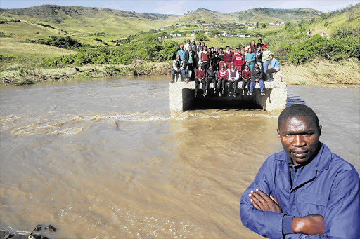 Most of Ntafulu Bridge, which connects 13 villages to the R61 road between Port St Johns and Lusikisiki, was washed away by floods. Sanele Swelindawo could not cross to get to work while children on the other side could not get to school