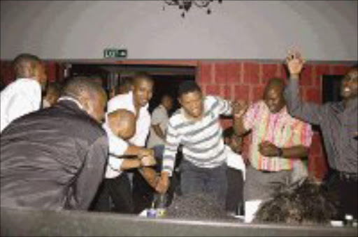 HAVING A BALL; The 63rd anniversary of the African National Congress Youth League was celebrated at Zambezi lounge, one of the best clubs in Jozi, on Monday night. Pic. Siphiwe Malaza. 11/09/07. © Sowetan.