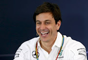 Mercedes Formula One Executive Director (Business) Toto Wolff smiles during a news conference after the second practice session of the Australian F1 Grand Prix at the Albert Park circuit in Melbourne March 14, 2014.