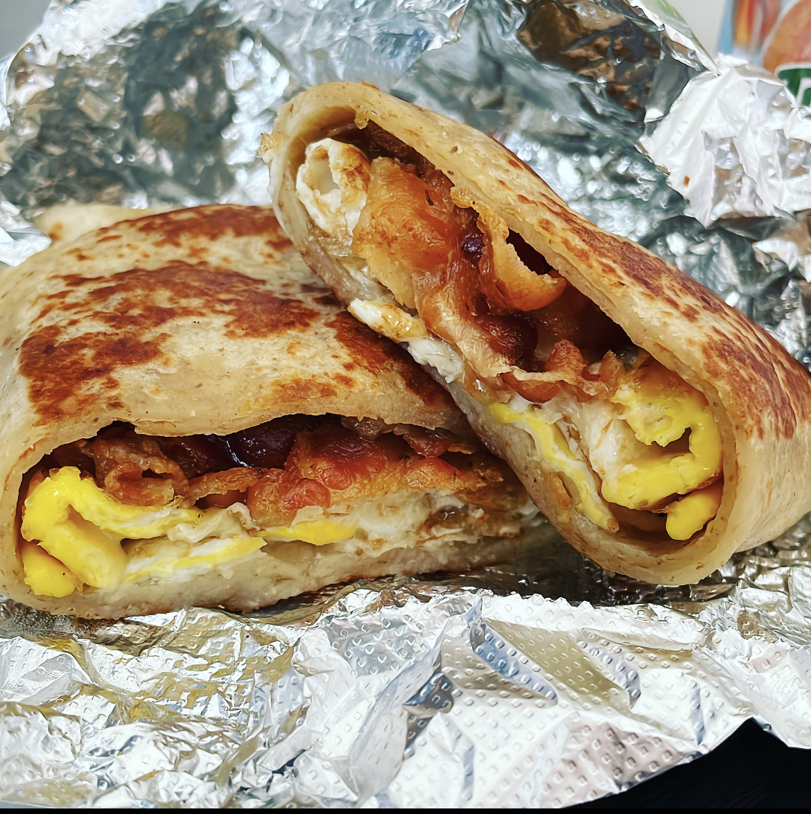 Bacon egg and cheese on a gluten free wrap.