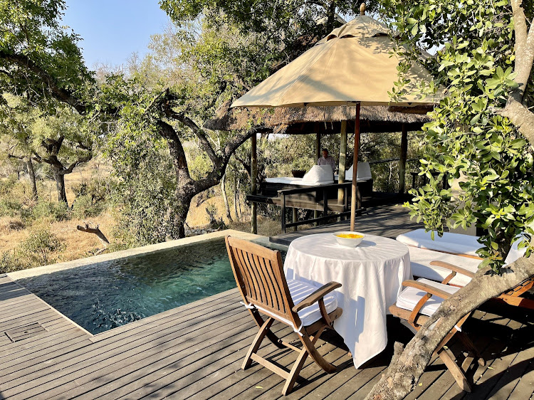 Private plunge pool and dining area on the deck of my Luxury Suite.