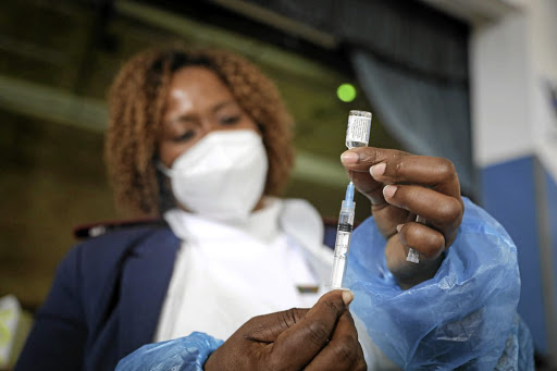 A nurse preparing to vaccinate.