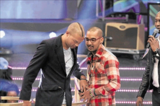 IN THE MONEY: Cape Town-born Keagan, seen with Lee, right, was yesterday crowned the winner of Big Brother Africa Stargame. PHOTO: COBUS BODENSTEIN