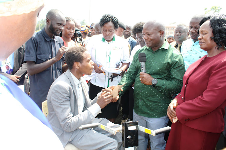 Kakamega governor Fernandez Barasa interacting with persons living with disability at Bukhungu on Friday
