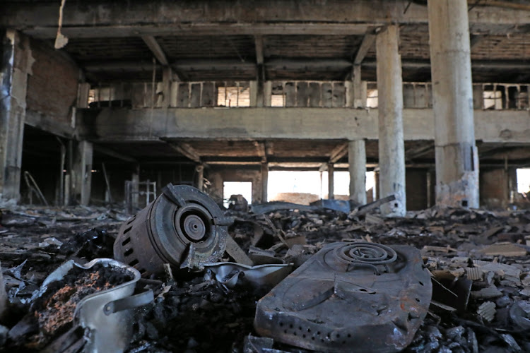 Inside the Usindiso building in Marshalltown in the Johannesburg CBD after the fire on August 31, which left 77 dead. A witness testified that the building's population swelled from housing 50 women to over 400 people when the landlord left in 2019. File photo.