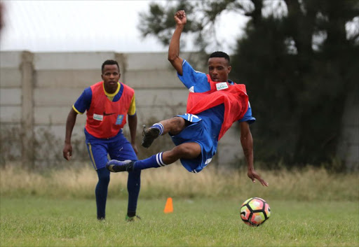 Future Tigers striker Andile Bhatyi has a spectacular attempt at goal while left back defender Sivuyile Zozi watches on during their training session at Jan Smuts Stadium ahead of ABC Motsepe League decider against EC Bees on Saturday PICTURE ALAN EASON