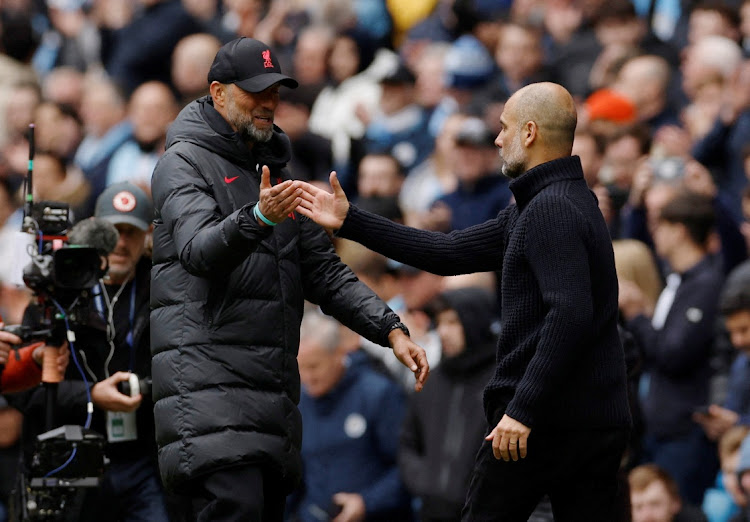 Liverpool manager Jurgen Klopp and Manchester City manager Pep Guardiola will meet again at Anfield on Sunday