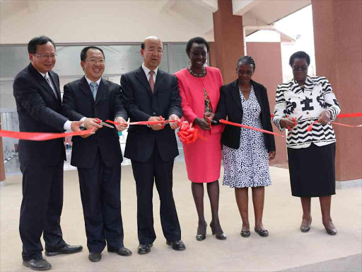 Prof Qing-Feng, Counsellor Guo Ce, Chinese Ambassador Dr Liu Xianfa, Njoki Kahiga, Bertha Dena and JKUAT vice chancellor Prof Mabel Imbuga during the official launch and hand over of the Chinese-funded Sino-Africa Joint Research Center in Juja on Monday /JOHN KAMAU