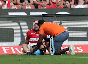 The Emirates Lions captain Warren Whiteley being treated on the field after sustaining an injury during the Super Rugby match against the Blues at Ellis Park, Johannesburg on 10 March 2018.