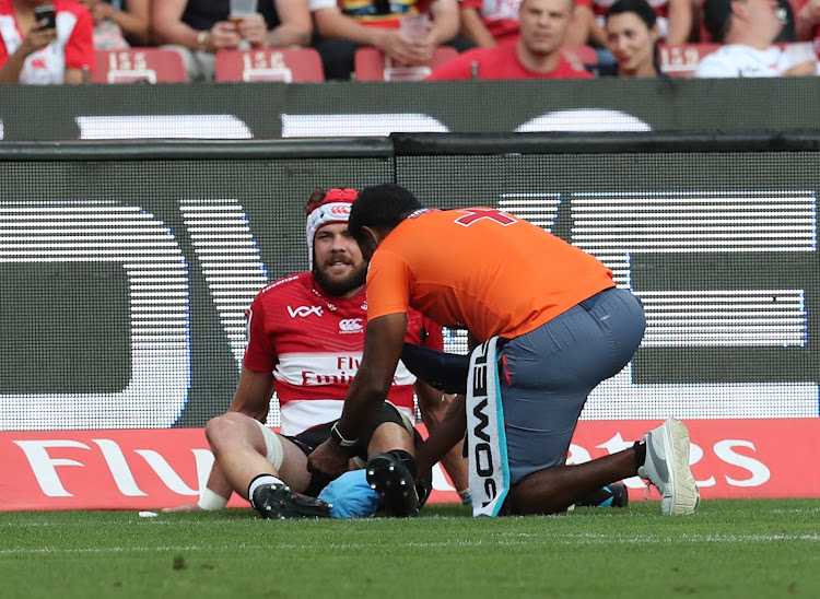 The Emirates Lions captain Warren Whiteley being treated on the field after sustaining an injury during the Super Rugby match against the Blues at Ellis Park, Johannesburg on 10 March 2018.