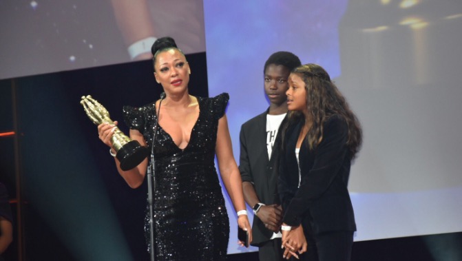 Lorcia Cooper with her children as she accepted her first Safta award.