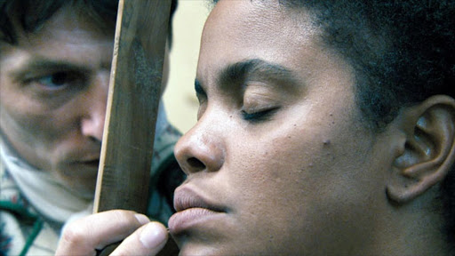 Cuban actress Yahima Torres as Sara Baartman in the 2010 film 'Black Venus'. Olivier Gourmet plays the impresario Reaux, who brought her to Paris to be displayed