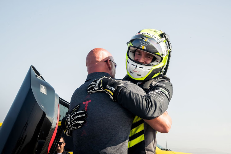 SSC boss Jerod Shelby congratulates driver Oliver Webb.