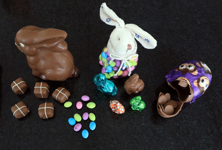 From left: Checkers Forage and Feast Hot Cross Bun Flavoured Milk Chocolates, Pick n Pay Daisy Bunny, Food Lover’s Market The Hoppery Speckled Eggs, Woolworths Hollow Milk Bunnie and Spar Cadbury’s Dairy Milk Buttons.