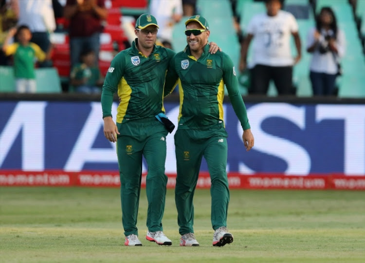 AB de Villiers and Faf du Plessis clebrate the first wicket during the 2nd ODI between South Africa and Sri Lanka at Sahara Stadium Kingsmead on February 01, 2017 in Durban.
