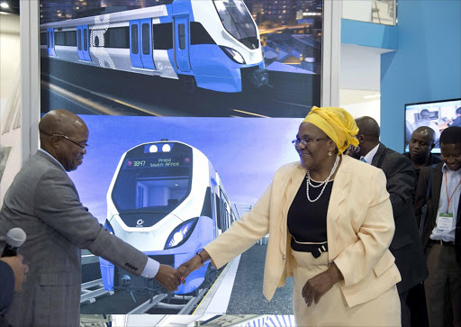 Sfiso Buthelezi , then Chairman of Passenger Rail with Dipuo Peters, then Minister of Transport at the media unveiling of the new train. Picture: Martin Rhodes. © Business Day