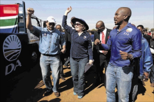 sUPPORT BASE: DA Gauteng leader John Moodey, with party leader Helen Zille and parliamentary leader Mmusi Maimane. Moodey is considering standing for party leader PHOTO: ALON SKUY