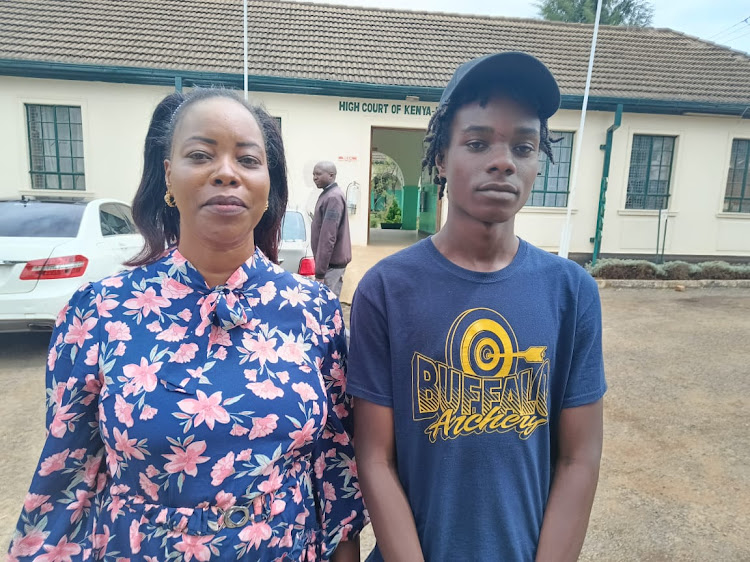 Eunita Kibor and her son Reuben leave the High Court in Eldoret where they filed an application seeking protection