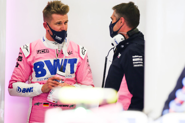 Nico Hulkenberg of Germany and Racing Point chats with his engineer during qualifying ahead of the F1 Eifel Grand Prix at the Nürburgring on October 10, 2020 in Nürburg, Germany.
