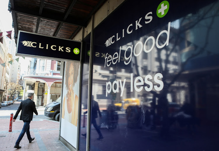 A man walks past a closed Clicks branch in Cape Town on September 9 2020 following protests by the EFF over what they said was a racist advertisement posted on its website, Picture: REUTERS/Sumaya Hisham