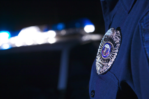 US police uniform and badge. File photo