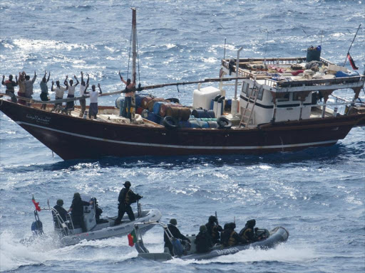 A file photo of Somali pirates approaching a fishing boat on the Indian Ocean. UN Chief Ban Ki-moon has said the pirates have been increasingly targeting dhows and fishing boats in the past year. /ELKANA JACOB