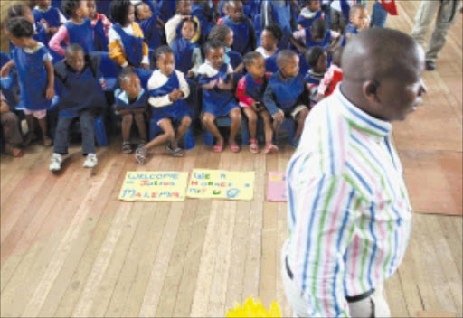 YOUNG, GIFTED AND BLACK: ANCYL president Julius Malema takes the league's drive to inspire youngsters at nursery schools. Youth activism should build the nation, not political ambition. Pic. Elizabeth Sejake. 18/02/2009. © Sowetan. Julius Malema visited the children from Intokozeni Soweto children singing for Julius saying the is no man like him.Pic ;Elizabeth Sejake.18/02/2009