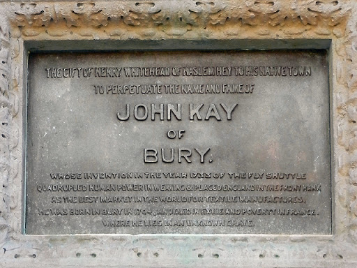 This bronze plaque is beneath the relief portrait of John Kay on the north face of SD8010 : Kay Monument, Bury. The inscription reads: THE GIFT OF HENRY WHITEHEAD OF HASLAM HEY TO HIS NATIVE TOWN...