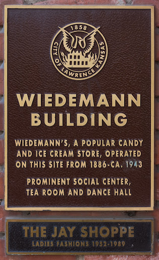 Wiedemann Building   Wiedemann’s, a popular candy and ice cream store, operated on this site from 1886–ca. 1943.   Prominent social center, tea room and dance hall.   The Jay Shoppe Ladies...