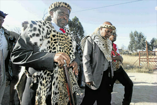 HOMECOMING CEREMONY: Amahlubi traditional leaders led by the tribe's leader, King Langalibalele ΙΙ, left, attend a traditional initiation homecoming ceremony for 28 young Amahlubi 'amakrwala' in Mthatha. Picture: LULAMILE FENI