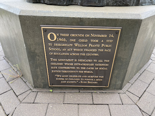 On these grounds on November 14, 1960, one child took a step to desegregate William Frantz Public School, an act which changed the face Of education across the country.This monument is dedicated...