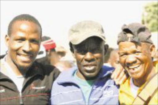 WINNERS: Trust Langa, Abraham Sonqishe and Johannes Moshe took top three honours in the veterans category during the inaugural Sowetan Big Walk in Mapetla, Soweto. Pic. Mbuzeni Zulu. 01/05/08. © Sowetan.