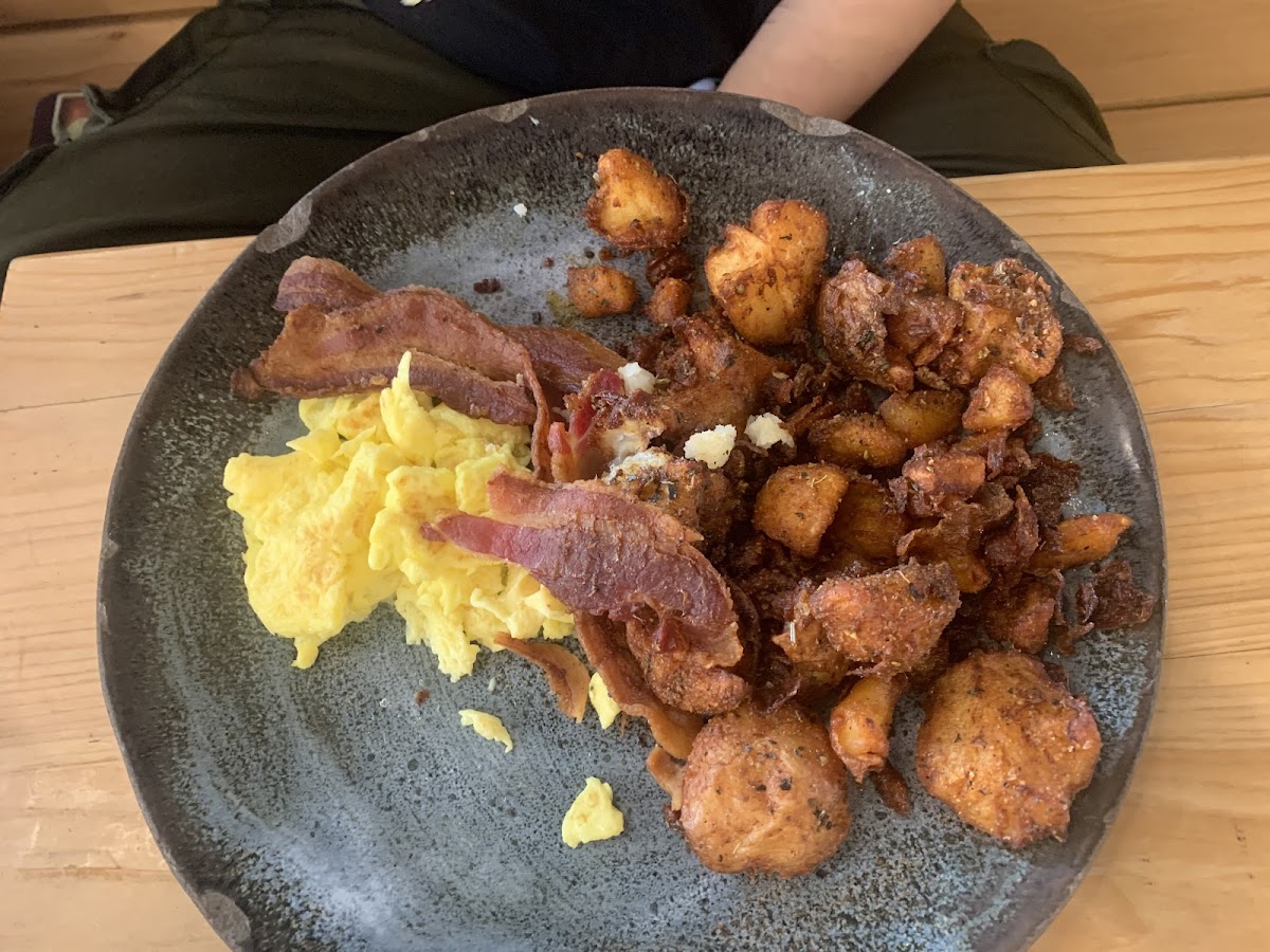 Kids started eating before i got pics but this was scrambled eggs, bacon, and nee orleans style breakfast potatoes with GF pancakes (not pictured)