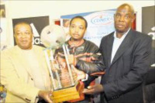 COMMITTED: Peter Matseke, left, Bobby Morewa and Phil Mogodi during the draw for the Stix Morewa Soccer Challenge in Pimville yesterday. Pic. Mohau Mofokeng. 04/06/08. © Sowetan.