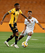  Pule Mmodiof Kaizer Chiefs in action with Sihle Nduli of Stellenbosch FC during the DStv Premiership match between Kaizer Chiefs and Stellenbosch FC at FNB Stadium.